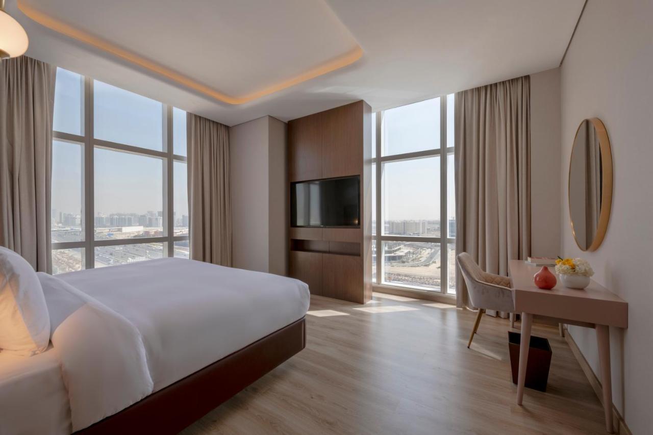 Movenpick Jumeirah Village Triangle Dubaj Zewnętrze zdjęcie A bedroom at the hotel