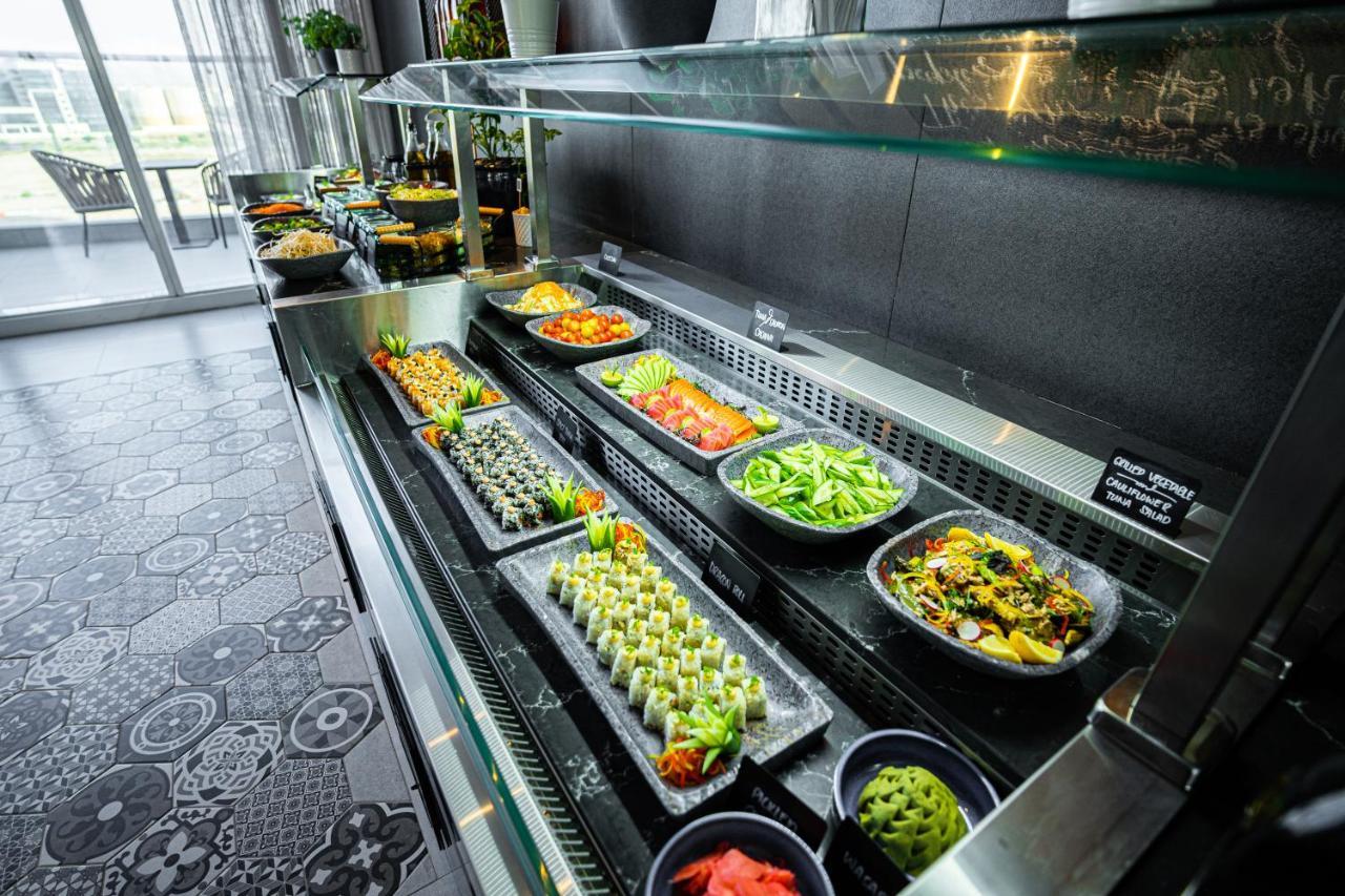 Movenpick Jumeirah Village Triangle Dubaj Zewnętrze zdjęcie A salad bar