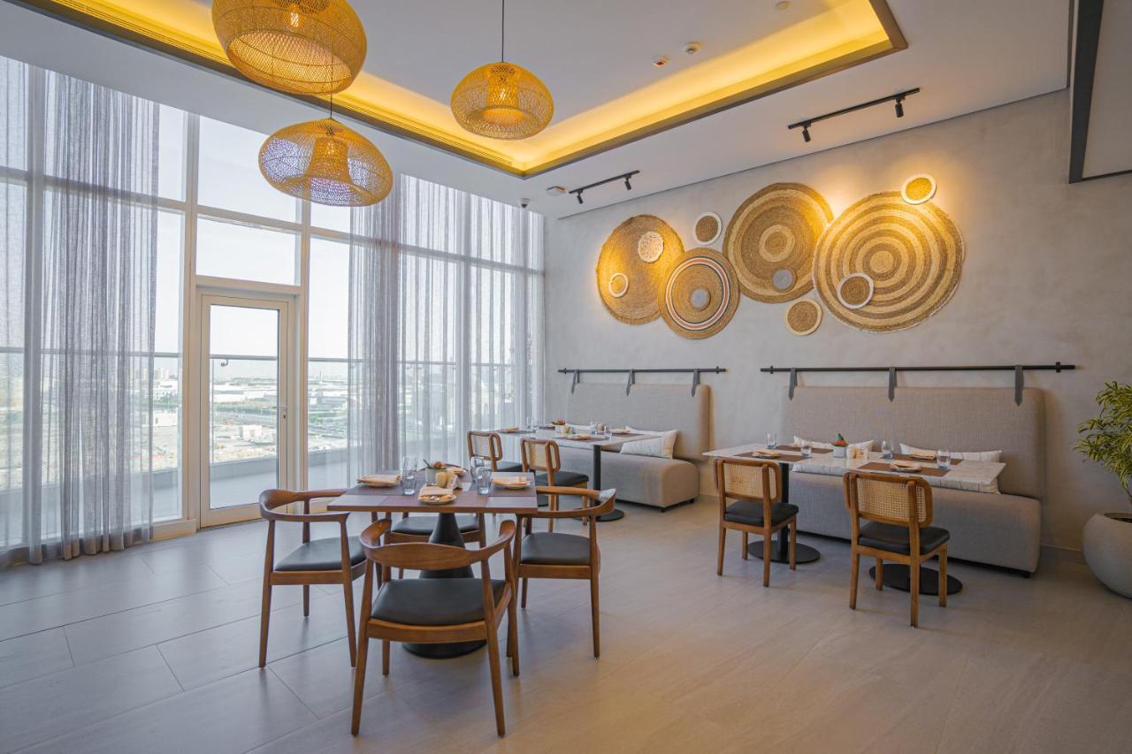 Movenpick Jumeirah Village Triangle Dubaj Zewnętrze zdjęcie The restaurant