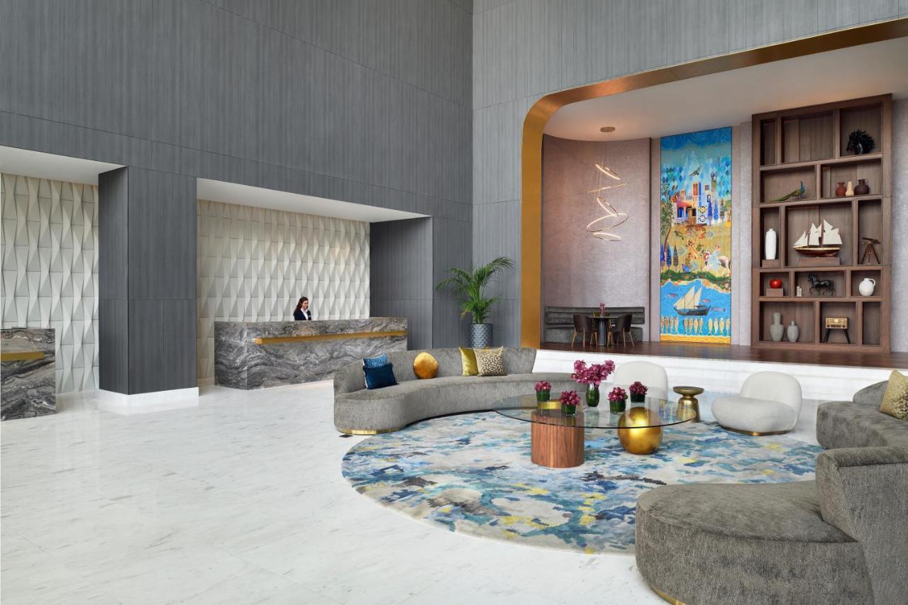 Movenpick Jumeirah Village Triangle Dubaj Zewnętrze zdjęcie The lobby of the hotel