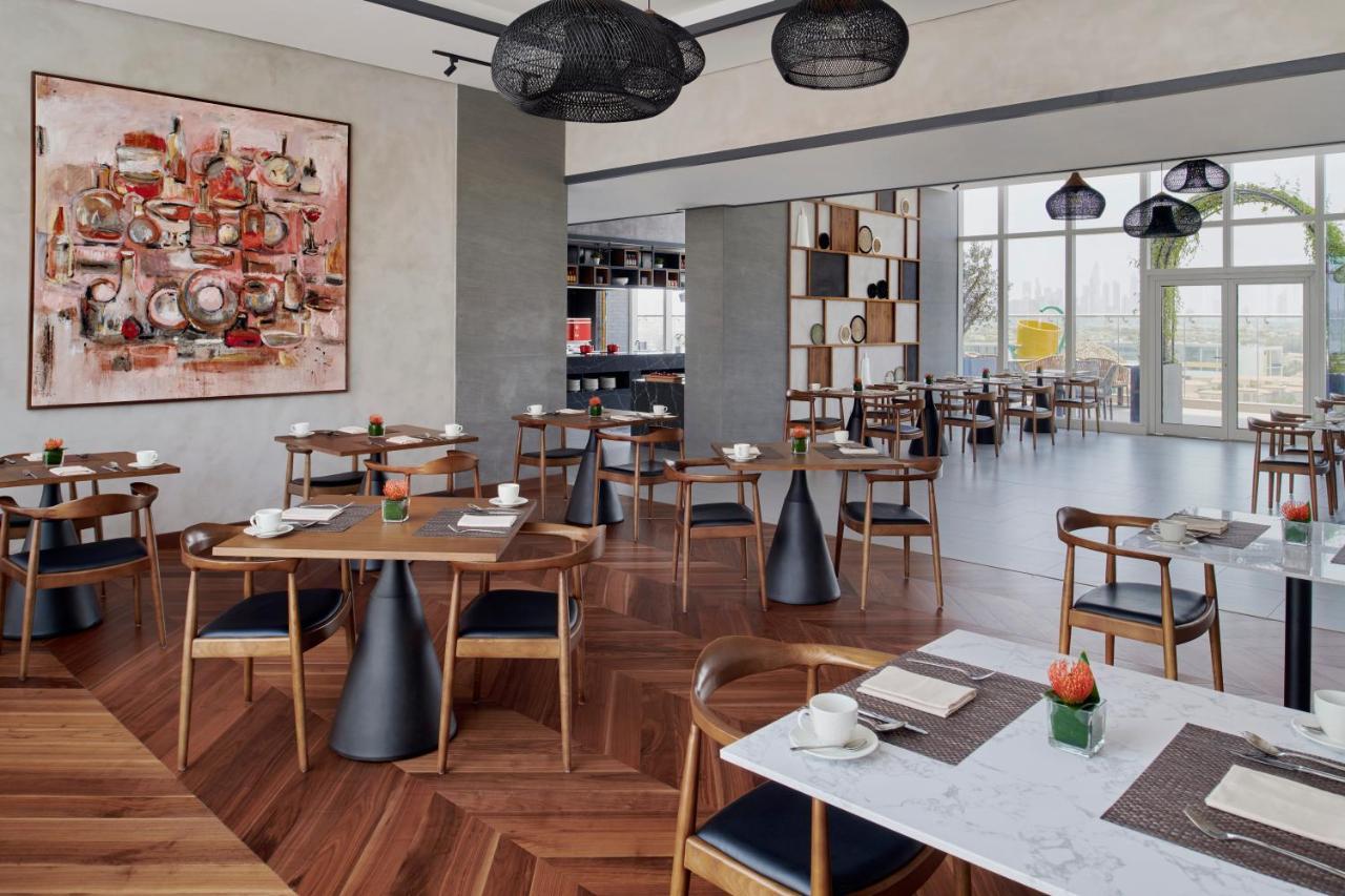 Movenpick Jumeirah Village Triangle Dubaj Zewnętrze zdjęcie The restaurant