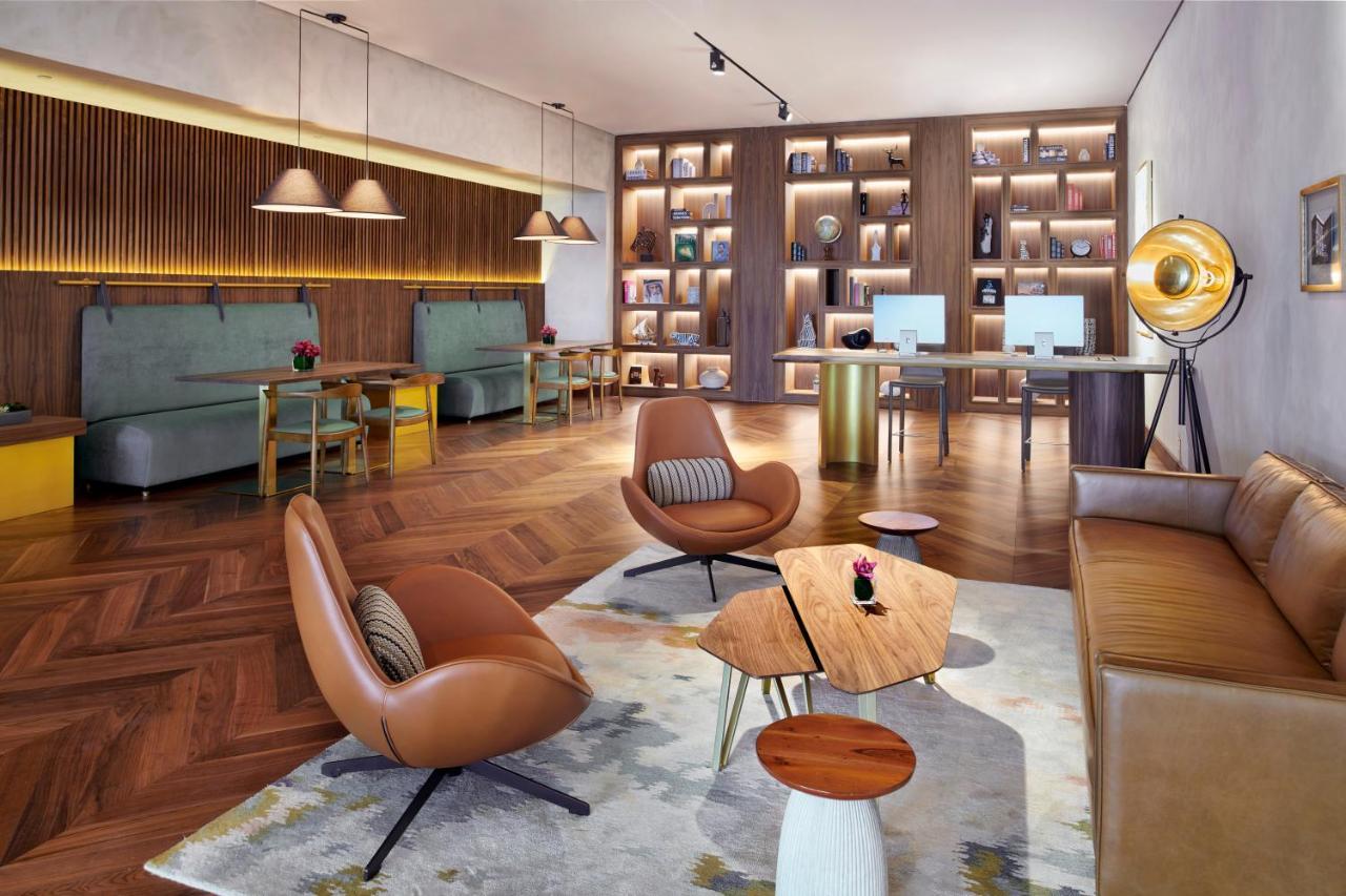 Movenpick Jumeirah Village Triangle Dubaj Zewnętrze zdjęcie The Library at The Hari